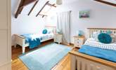 Pretty bedroom 2 has twin beds. - Thumbnail Image