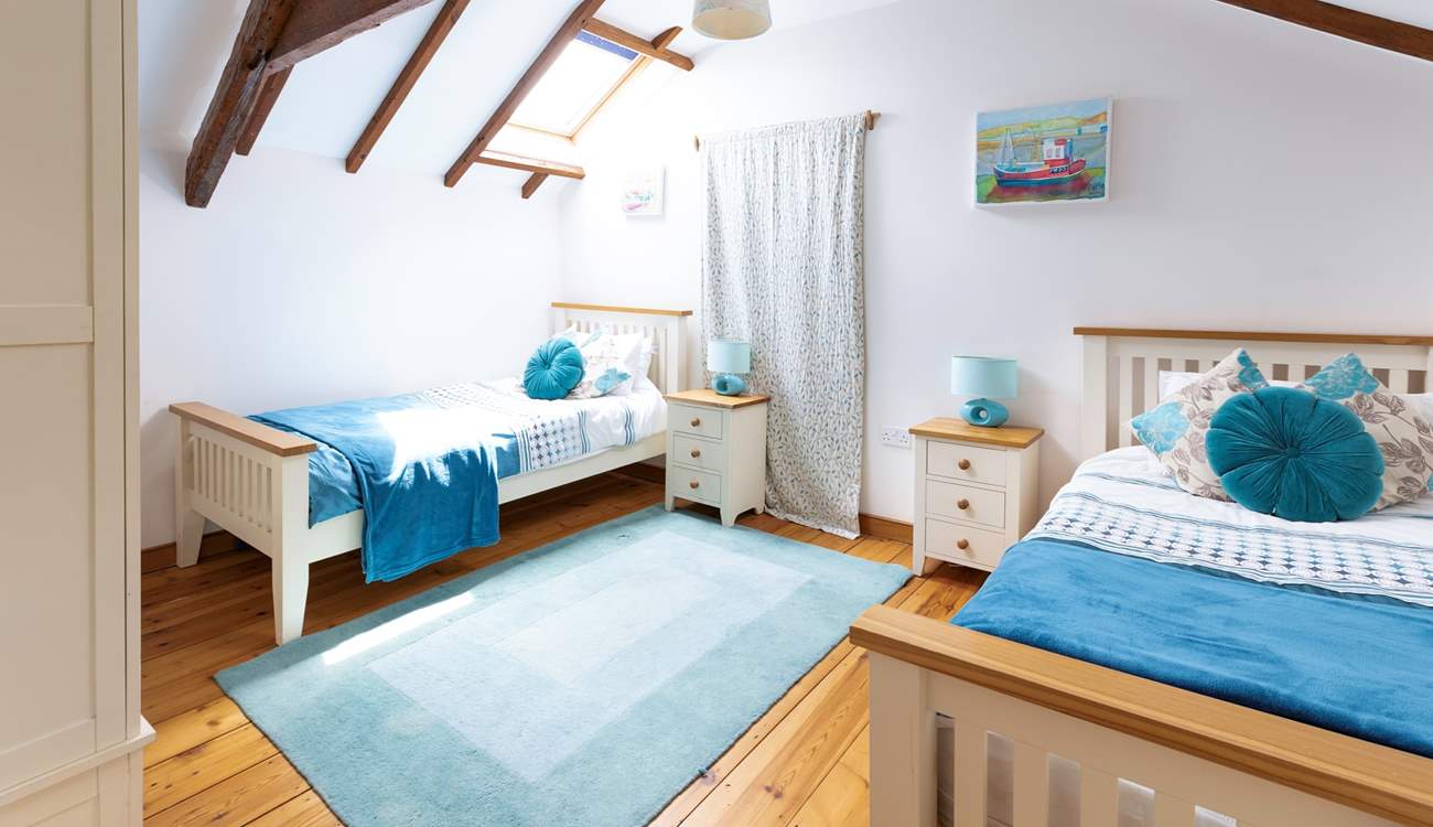 Pretty bedroom 2 has twin beds.