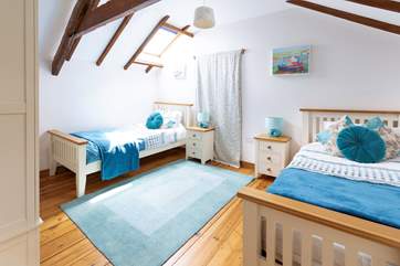 Pretty bedroom 2 has twin beds.