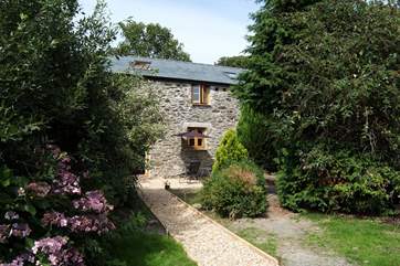 The delightful Horseshoe Cottage awaits you at the end of the path.