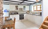 The well-equipped modern kitchen in a traditional barn. - Thumbnail Image