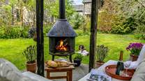 Set in the corner of the communal area you will find a beautiful log-burner and seating area, perfect for those summer evenings whilst the children play with the guests staying at Fig Tree.