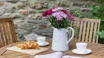 Enjoy a spot of al fresco dining on your holiday.