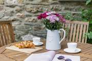 Enjoy a spot of al fresco dining on your holiday.