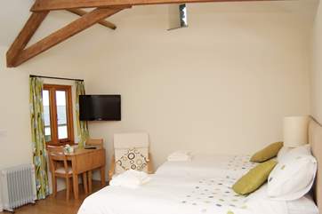 The annexe provides further accommodation for two, with its own wet-room and kitchenette (here it is made up as twin beds). This is a walk away from the cottage and not available at the lower price.