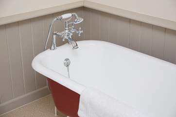 The bath in the ensuite for Bedroom 1.