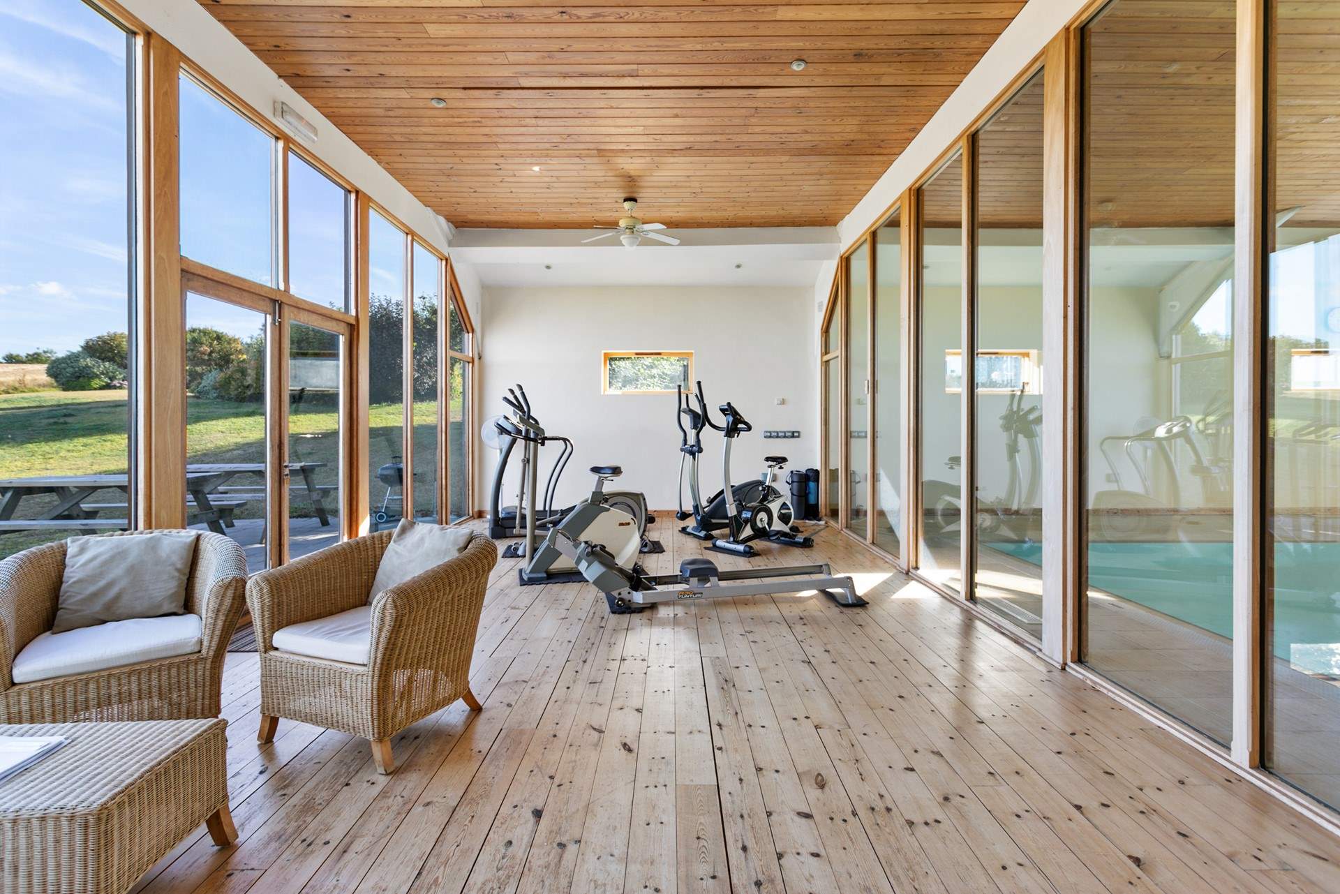 The small gym is equipped with a rowing machine, running machine, elliptical trainer and an exercise bike.