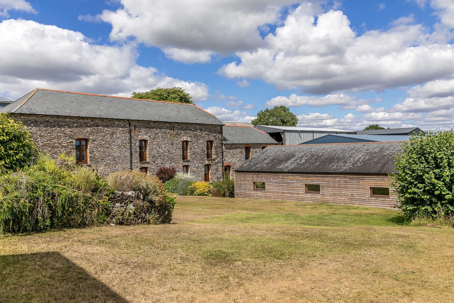 The back of the cottage with the pool-room to the right.