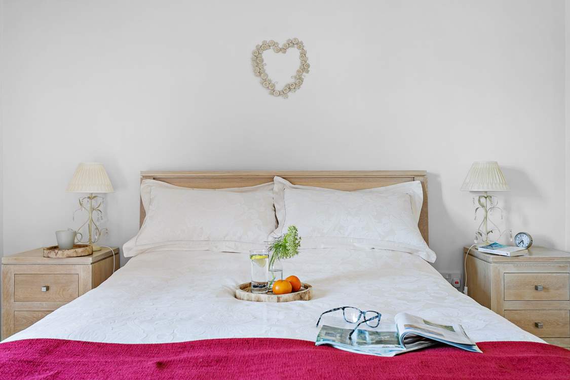 Snuggle up in the king-size bed.