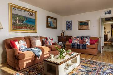 The sitting-room is light and comfortable.