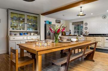 The Aga provides a warming backdrop to the kitchen/dining-room.