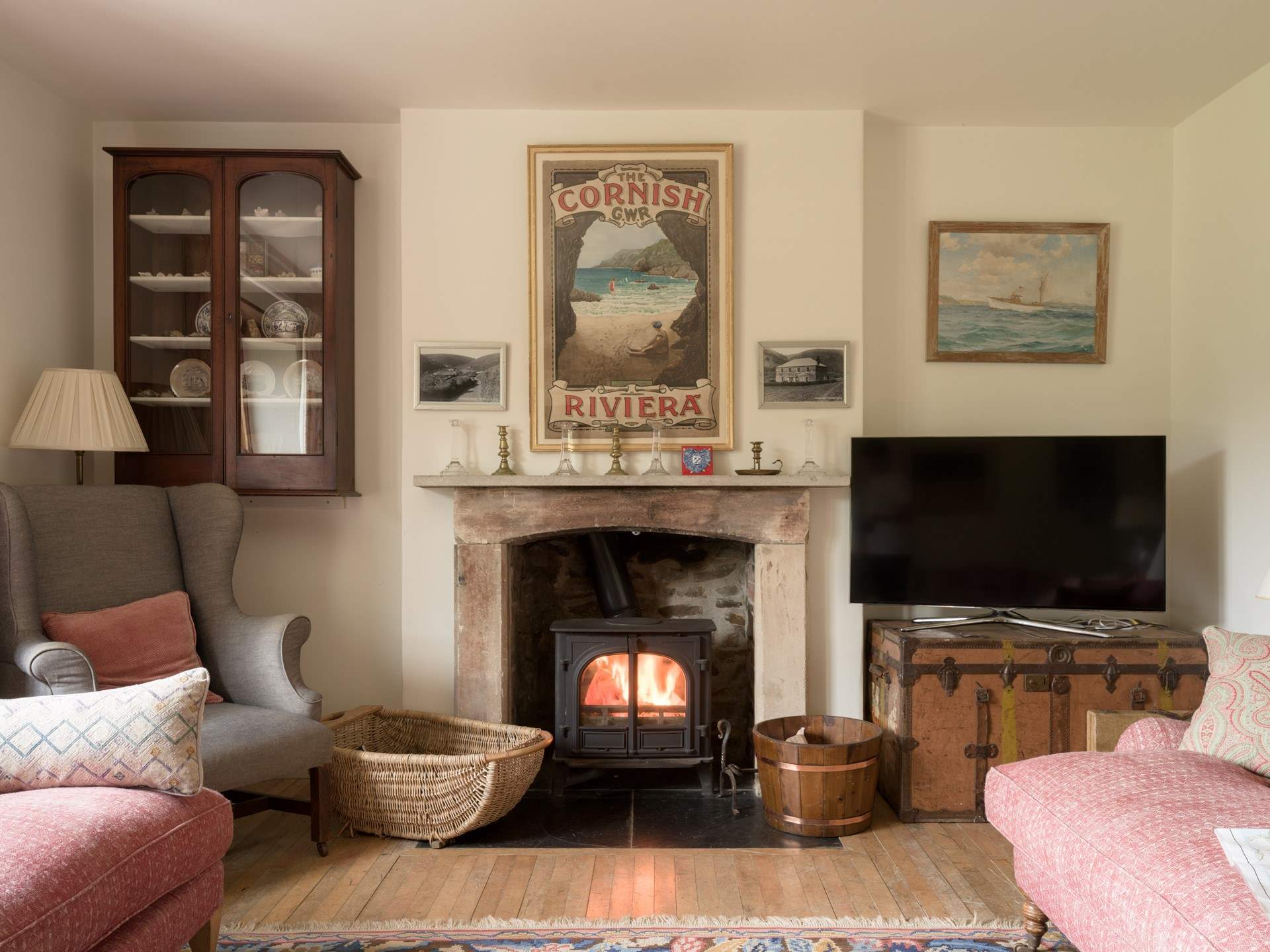 Snuggle up by the wood-burner in cooler months in the second sitting room. 