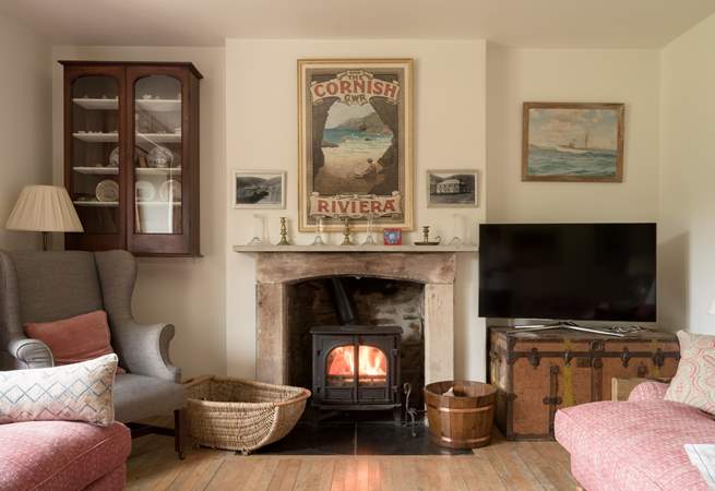 Snuggle up by the wood-burner in cooler months in the second sitting room. 