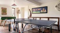 Fun and games around the tennis-table. 