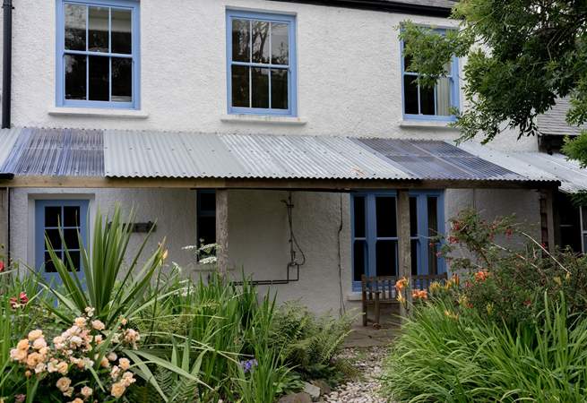 The covered porch area to the rear. 