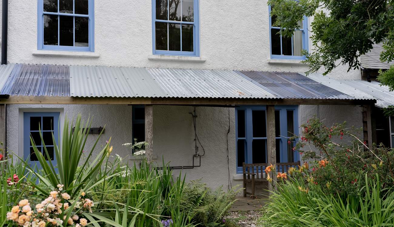 The covered porch area to the rear. 