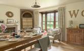 Gather everyone around the table to plan the day ahead.  - Thumbnail Image