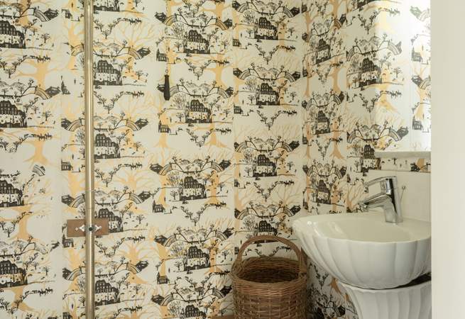 Snazzy wallpaper in the ground floor WC.