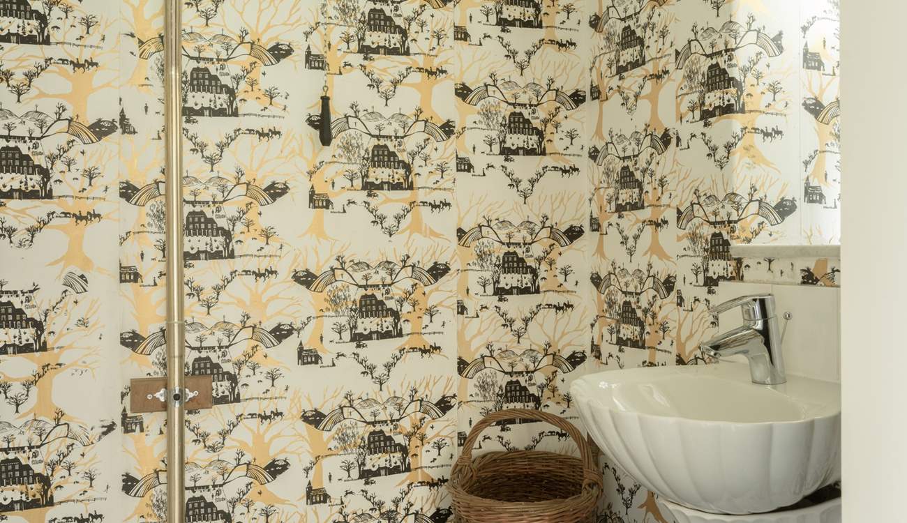 Snazzy wallpaper in the ground floor WC.