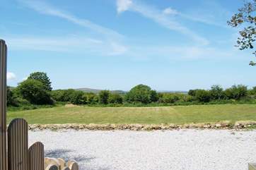 The lovely view across the meadow from the hot tub enclosure.