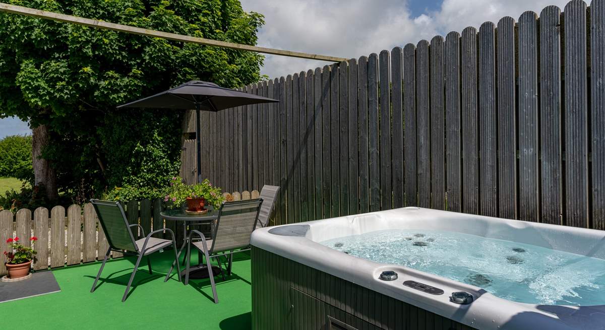 Daisy's private hot tub enclosure, with lovely views across the meadow and beyond. (Please note there is an additional charge for the hot tub).