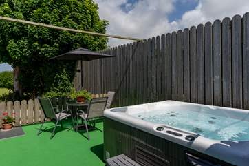 Daisy's private hot tub enclosure, with lovely views across the meadow and beyond. (Please note there is an additional charge for the hot tub).