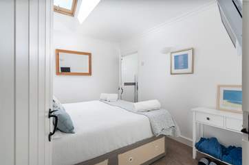 The lovely master bedroom has a hotel quality super-king bed.