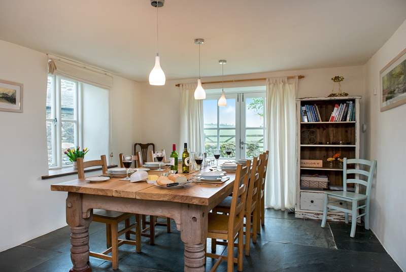 Mealtimes will be a treat around the dining-table, where you can enjoy views out to the garden.