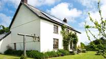 Grascott House is a fabulous farmhouse with room inside and out for all the family. Free range children and dogs welcome!
