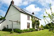 Grascott House is a fabulous farmhouse with room inside and out for all the family. Free range children and dogs welcome!