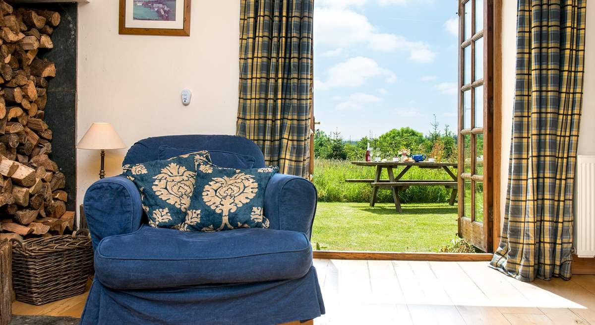 Double doors lead out from the living-area to the garden.