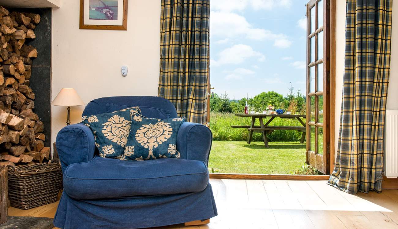 Double doors lead out from the living-area to the garden.