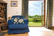 Double doors lead out from the living-area to the garden.