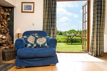 Double doors lead out from the living-area to the garden.