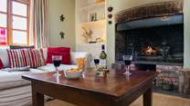 Another wood-burner in the sitting-room makes this an ideal retreat all year round.