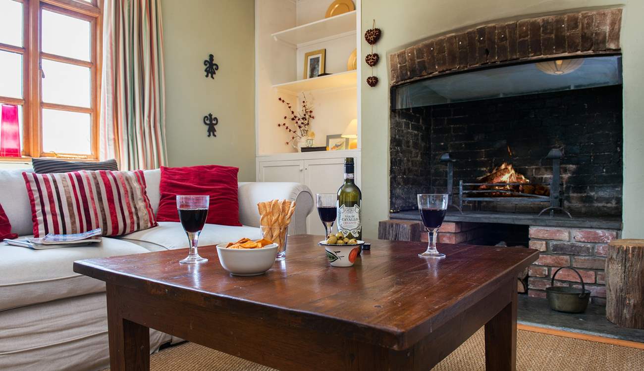 Another wood-burner in the sitting-room makes this an ideal retreat all year round.
