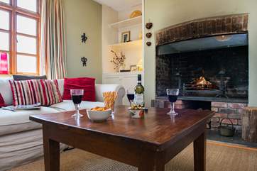 Another wood-burner in the sitting-room makes this an ideal retreat all year round.