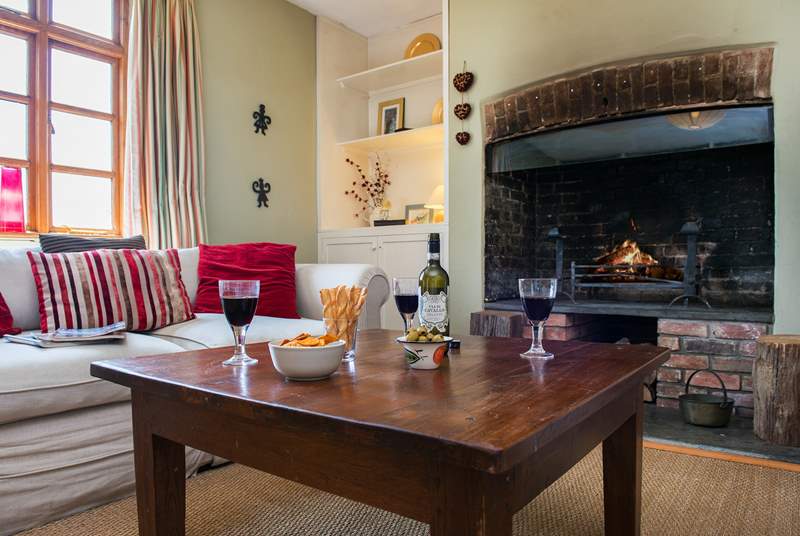 Another wood-burner in the sitting-room makes this an ideal retreat all year round.