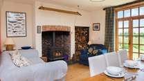 You can enjoy time in front of the wood-burner in the main living-room and watch the cooks at work!