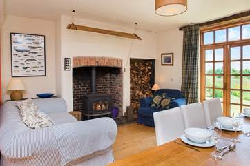 You can enjoy time in front of the wood-burner in the main living-room and watch the cooks at work!