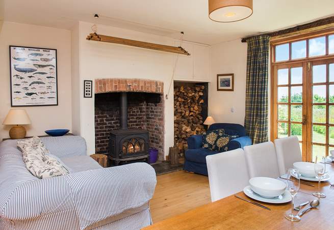 You can enjoy time in front of the wood-burner in the main living-room and watch the cooks at work!