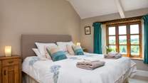 Bedroom 1 is beautifully furnished and enjoys views over the garden.