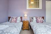 Bedroom 3 has twin beds.