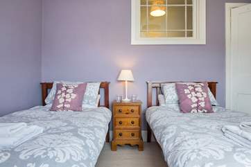 Bedroom 3 has twin beds.