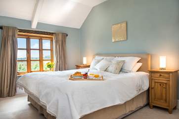 Bedroom 2 has lovely views across the garden.