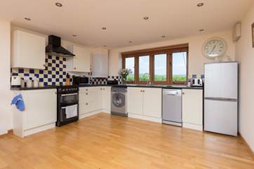 The kitchen is well set out, extremely well-equipped and has unspoilt rural views from the kitchen sink! Not that you have to wash up as of course there is a dishwasher.