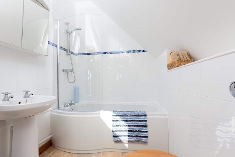 The bathroom offers a lovely bath or a shower if you prefer. There is a heated towel rail for toasty towels.