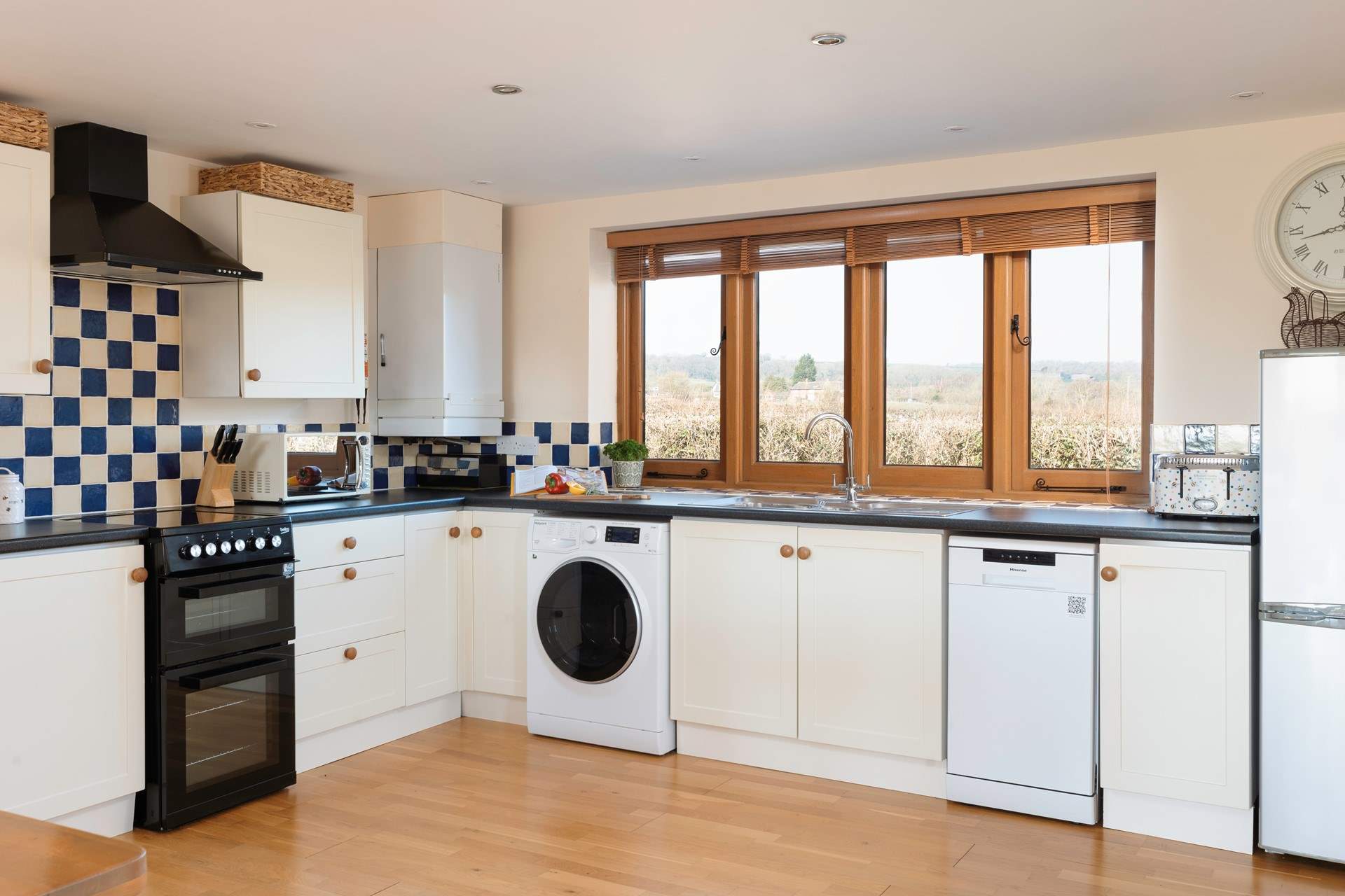 The kitchen is well set out, extremely well-equipped and has unspoilt rural views from the kitchen sink! 