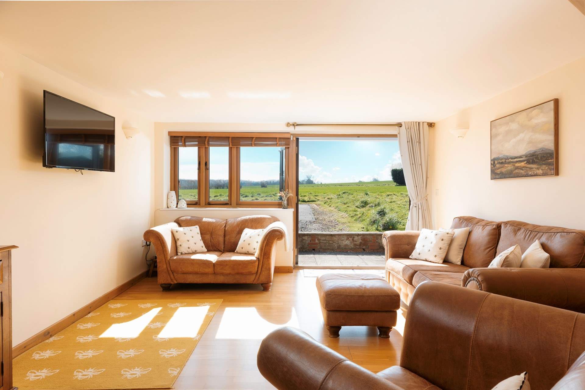 There are two wonderful squishy sofas and a deep armchair too. Plenty of choice for you all.