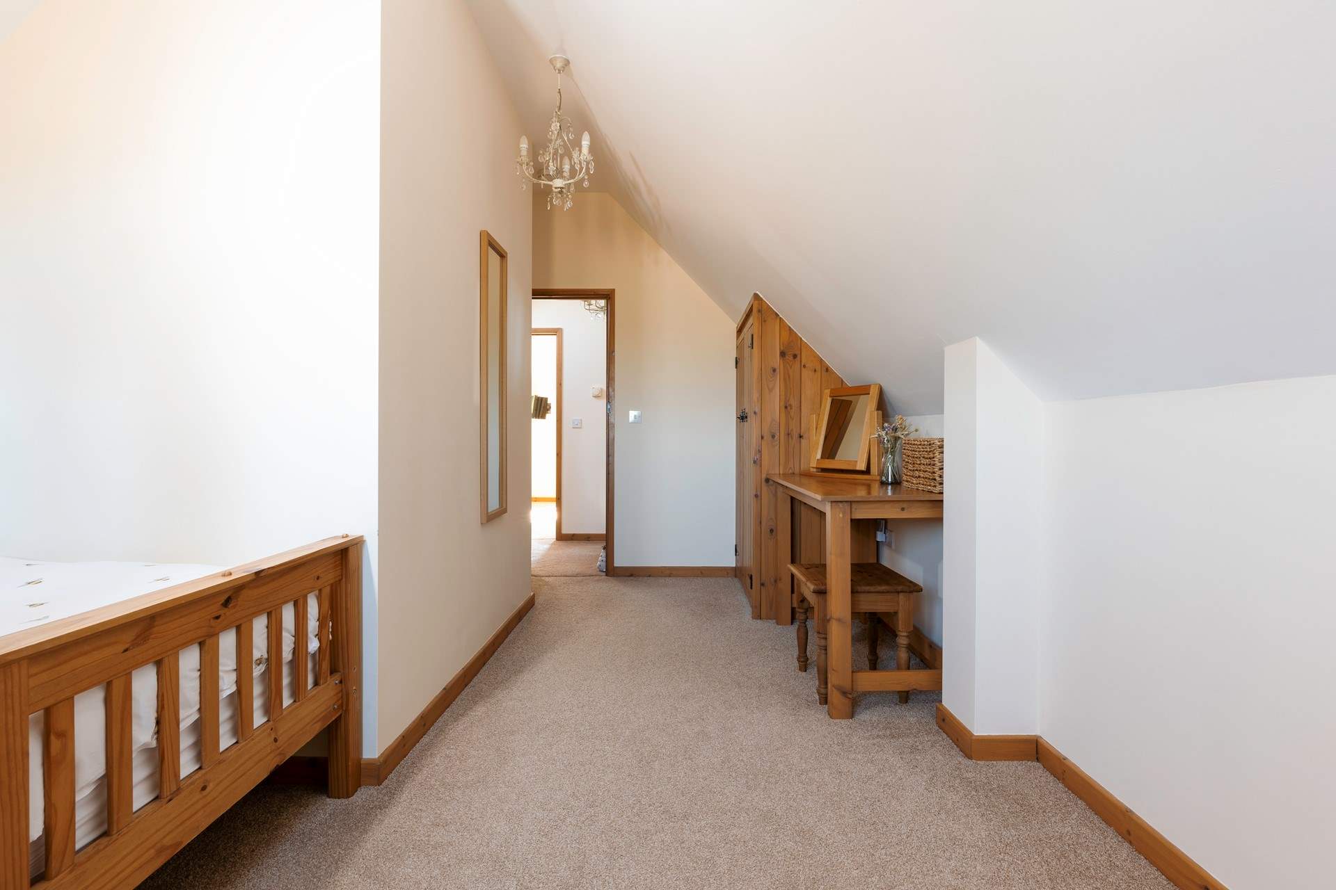 There are large wardrobes and dressing areas in both bedrooms.